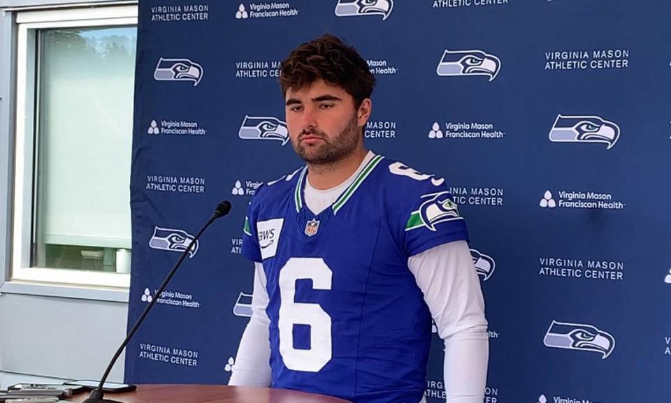 Quarterback Sam Howell speaks to reporters following the Seahawks’ fifth of 10 NFL organized team activities (OTAs) practices at team headquarters in Renton, May 30, 2024.