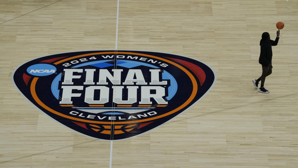 A person spins a basketball on their finger during South Carolina's practice for the NCAA Women's Final Four championship basketball game Saturday, April 6, 2024, in Cleveland. (AP Photo/Carolyn Kaster)