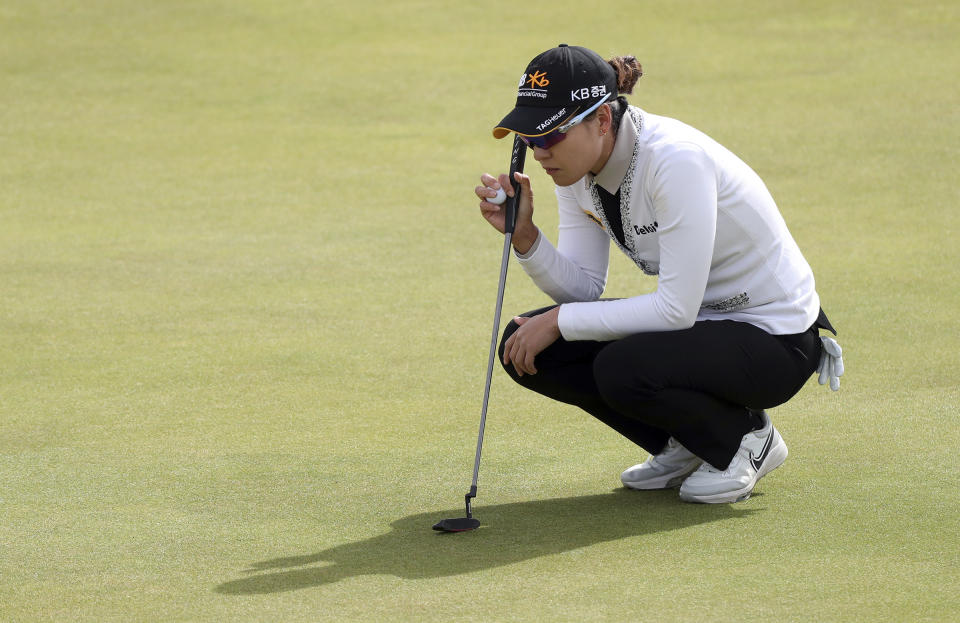 In Gee Chun of south Korea lines her putt on the 3rd green during the third round of the Women's British Open golf championship, in Muirfield, Scotland Saturday, Aug. 6, 2022. (AP Photo/Scott Heppell)