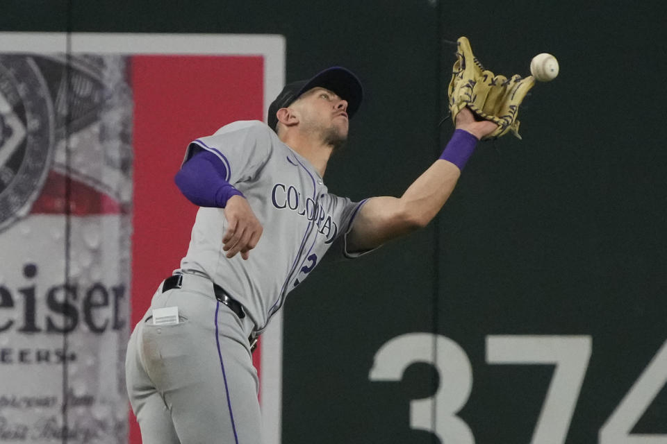 Colorado Rockies right fielder Nolan Jones drops a fly ball hit by Arizona Diamondbacks' Ketel Marte during the fifth inning of a baseball game Sunday, March 31, 2024, in Phoenix. (AP Photo/Rick Scuteri)