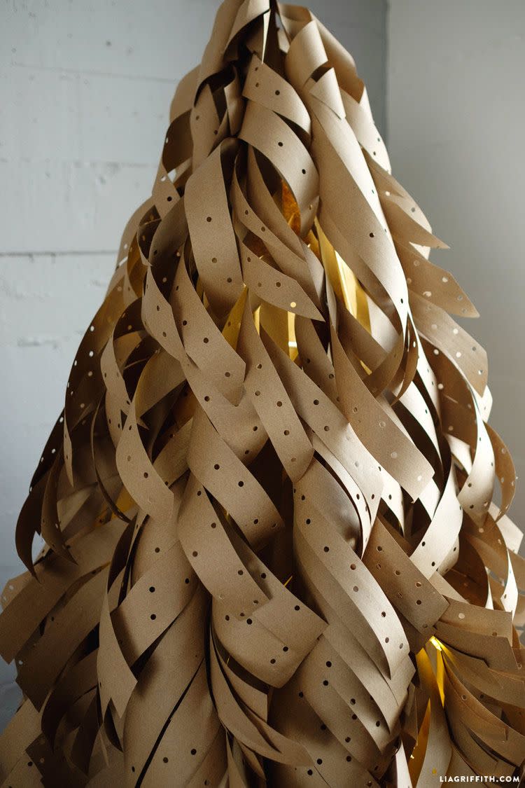 <p>Sure, kraft paper certainly serves practical purposes. But as it turns out, it looks amazing when it's transformed into a Christmas tree. With some swirls, twirls, and a paper punch, kraft paper suddenly looks perfectly festive. </p><p><strong>Get the tutorial at <a href="https://go.redirectingat.com?id=74968X1596630&url=https%3A%2F%2Fliagriffith.com%2Four-kraft-paper-christmas-tree%2F&sref=https%3A%2F%2Fwww.countryliving.com%2Fhome-design%2Fdecorating-ideas%2Fg28872053%2Falternative-christmas-trees%2F" rel="nofollow noopener" target="_blank" data-ylk="slk:Lia Griffith;elm:context_link;itc:0;sec:content-canvas" class="link ">Lia Griffith</a>.</strong></p><p><a class="link " href="https://www.amazon.com/Brown-Jumbo-Kraft-Paper-Roll/dp/B077PBFKBW/ref=sxin_3_ac_d_pm?tag=syn-yahoo-20&ascsubtag=%5Bartid%7C10050.g.28872053%5Bsrc%7Cyahoo-us" rel="nofollow noopener" target="_blank" data-ylk="slk:SHOP KRAFT PAPER;elm:context_link;itc:0;sec:content-canvas">SHOP KRAFT PAPER</a></p>