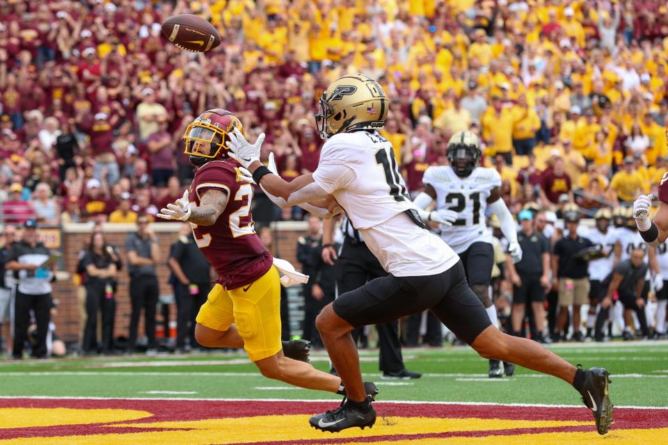 Purdue safety Cam Allen (10) intercepts a pass against Minnesota during the second quarter at Huntington Bank Stadium.