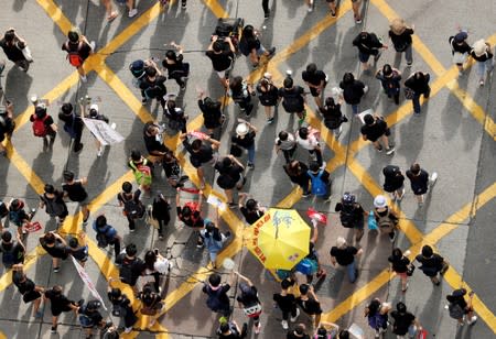 FILE PHOTO: Demonstration demanding Hong Kong's leaders to step down and withdraw the extradition bill, in Hong Kong