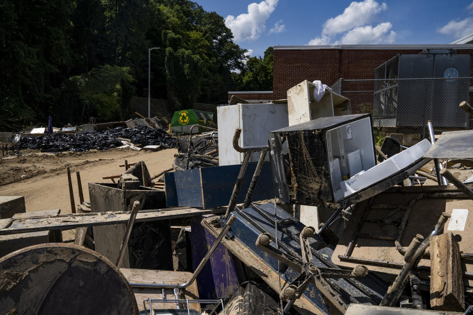 Image: Contents of the classrooms at the Buckhorn School are thrown away due to water damage and contamination in Buckhorn, Ky., on Aug. 19, 2022. (Michael Swensen for NBC News)