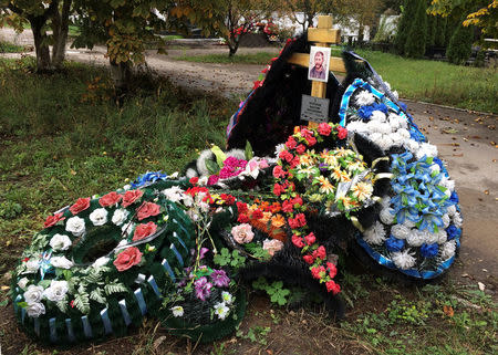 A grave of Russian contractor Maxim Kolganov, who was killed in combat in Syria, is pictured in his hometown of Togliatti, Russia, September 29, 2016. REUTERS/Maria Tsvetkova