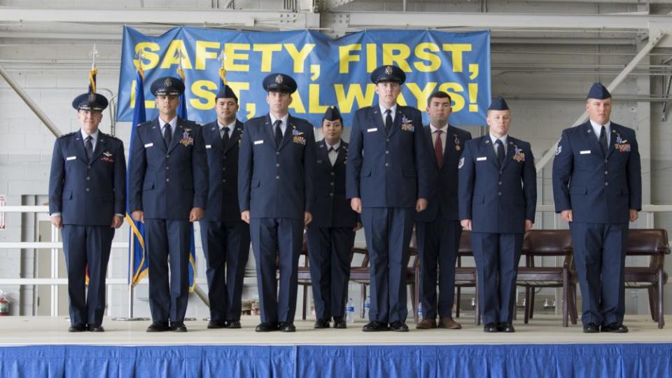 The crew of Shadow 71 pose after receiving the Distinguished Flying Cross and an Air Medal during a ceremony at Hurlburt Field, Florida, June 22, 2021