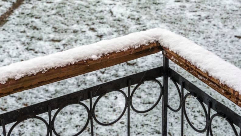 Credit:                      Getty Images / Andrey Nikitin                                             Add railing to your porch to give you support.
