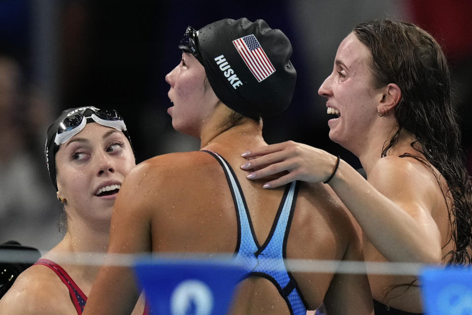 On a wild final night of swimming, U.S. sets two world records, edges