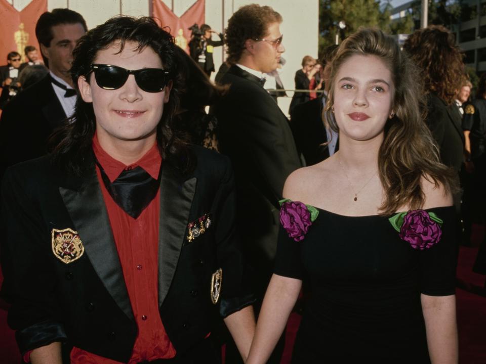 Corey Feldman and Drew Barrymore attend the 61st Annual Academy Awards, held at the Shrine Auditorium in Los Angeles, California, 29th March 1989