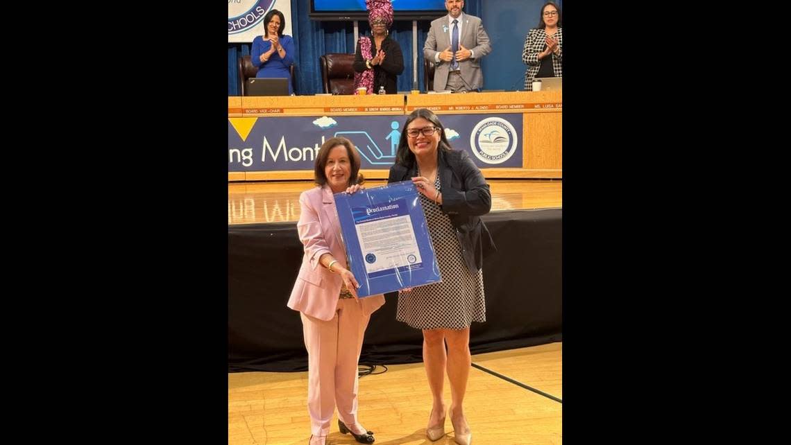 Enid Weisman was presented with a proclamation at the January School Board meeting by Lucia Baez-Geller in recognition of 47 years of service at Miami-Dade County Public Schools.