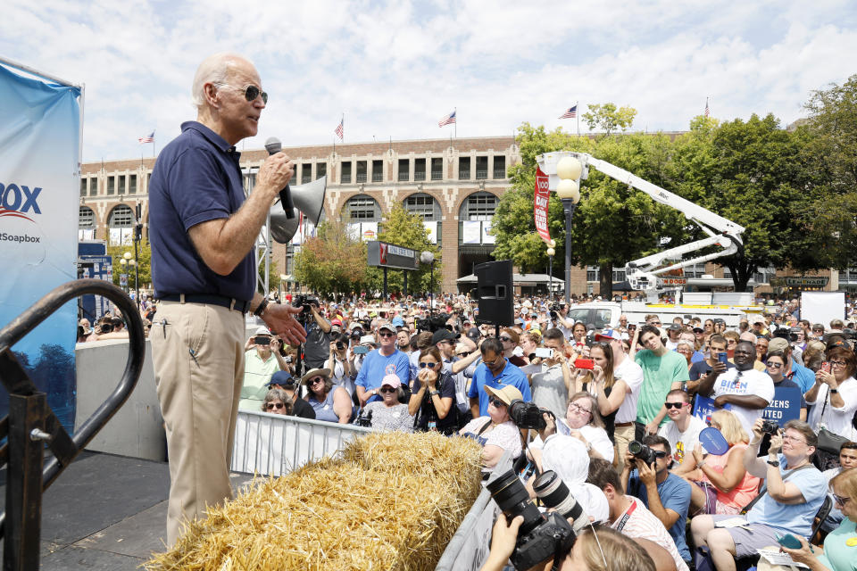 FILE - In this Aug. 8, 2019 file photo, then Democratic presidential candidate former Vice President Joe Biden speaks at the Des Moines Register Soapbox during a visit to the Iowa State Fair in Des Moines, Iowa. With coronavirus cases rising throughout Iowa and around the nation, health experts are becoming increasingly worried about next month's Iowa State Fair, which will bring more than 1 million people to Des Moines. (AP Photo/Charlie Neibergall File)