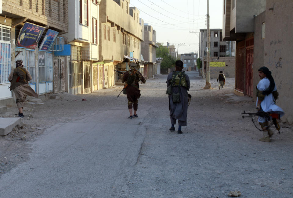 Private militia loyal to Ismail Khan, the former Mujahideen commander, patrols after security forces took back control of parts of Herat city following fighting between Taliban and Afghan security forces in Herat province, west of Kabul, Afghanistan, Friday, Aug. 6, 2021. (AP Photo/Hamed Sarfarazi)