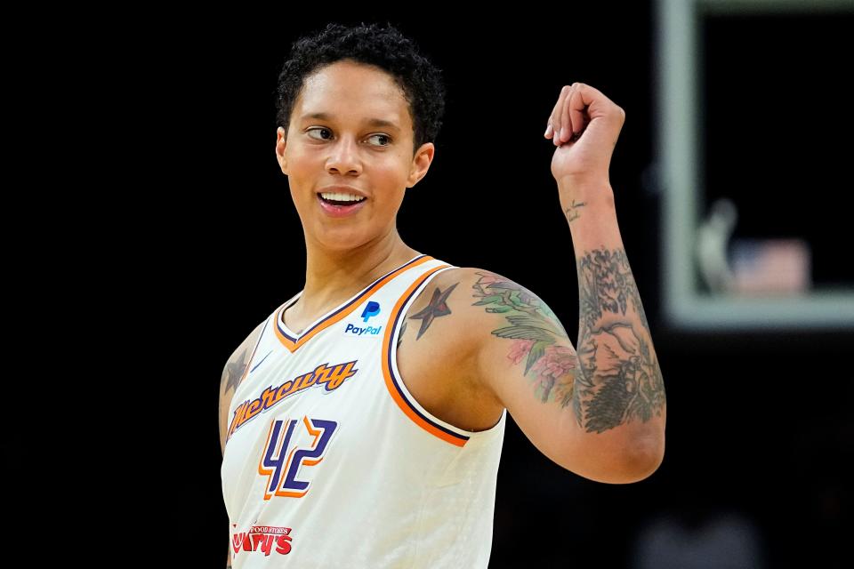 Phoenix Mercury center Brittney Griner smiles during the first half of a WNBA preseason basketball game against the Los Angeles Sparks on May 12, 2023, in Phoenix.