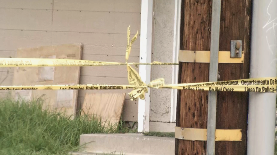 Crime scene tape is seen after an officer-involved shooting in Reseda on March 21, 2024.