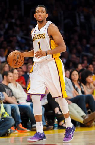 <p>Noah Graham/NBAE via Getty </p> Darius Morris playing for the Los Angeles Lakers in 2013