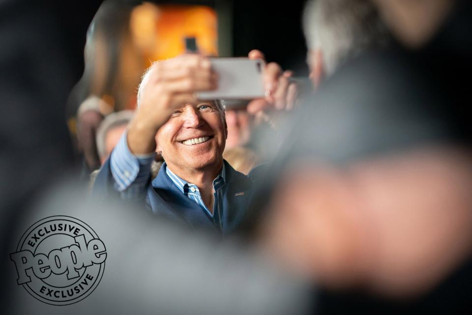 Biden poses for a selfie after speaking at Big Grove Brewery and Taproom in Des Moines, Iowa, on May 1, 2019.