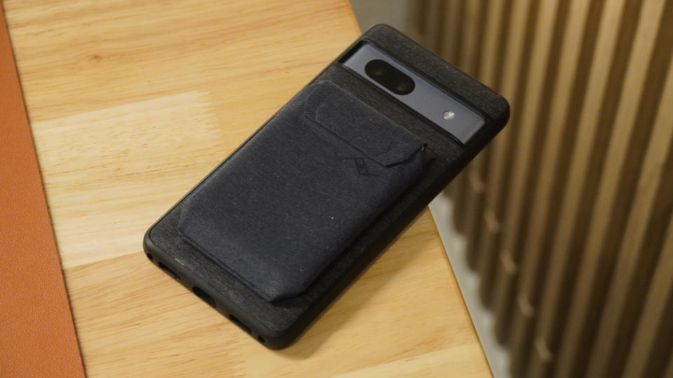 A wallet connected to a Peak Design Everyday Case.