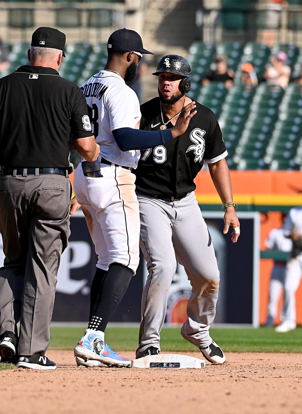 Tigers shortstop Niko Goodrum tagged White Sox first baseman Jose Abreu while stealing second base and causes a ninth-inning bench clearing scrum during the Tigers' 8-7 loss on Monday, Sept. 27, 2021, at Comerica Park.