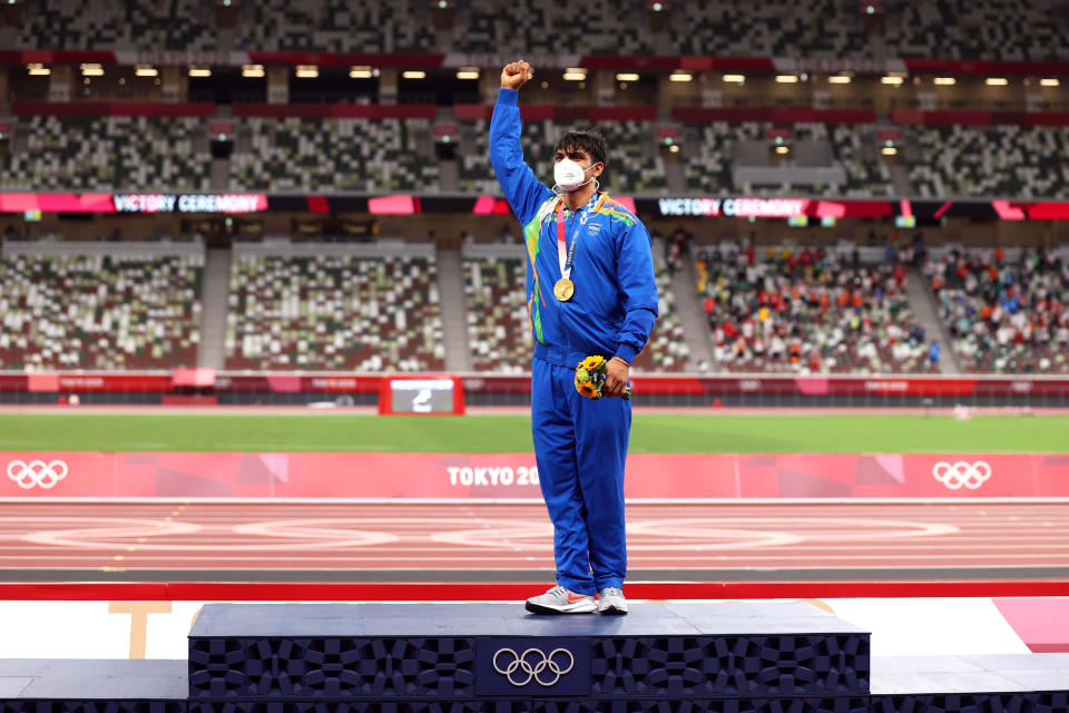 Tokyo 2020 Olympics - Athletics - Men's Javelin Throw - Medal Ceremony - Olympic Stadium, Tokyo, Japan - August 7, 2021. Gold medallist Neeraj Chopra of India celebrates on the podium REUTERS/Andrew Boyers