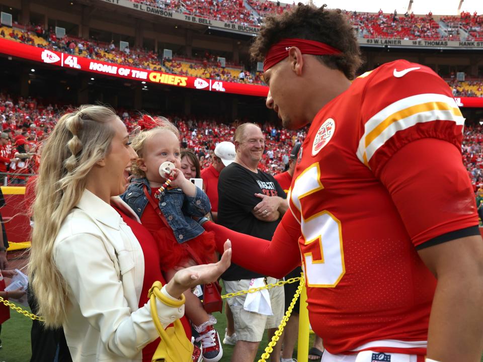 Patrick Mahomes with his wife, Brittany Matthews, and daughter, Sterling, before the game against the Los Angeles Chargers at Arrowhead Stadium on September 15, 2022 in Kansas City, Missouri.