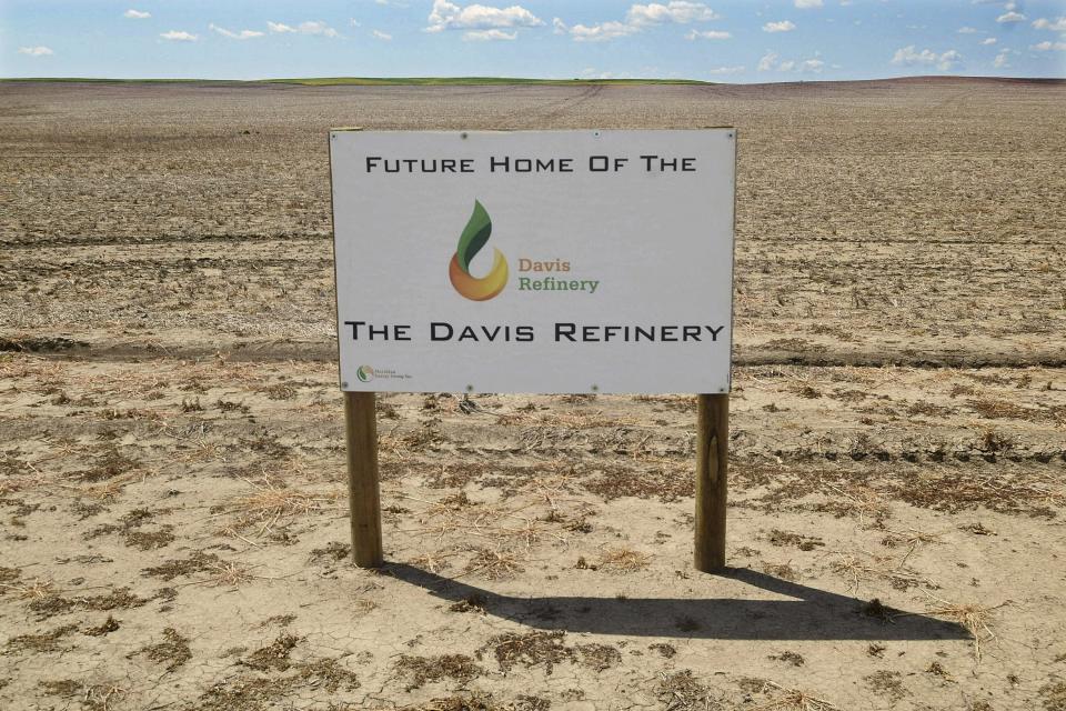 FILE--This July 19, 2018, file photo, shows the property in southwest Belfield, N.D that is the future home The Davis Refinery near Theodore Roosevelt National Park. Parties involved in a dispute over whether North Dakota regulators should be involved in the siting of a controversial oil refinery near Theodore Roosevelt National Park are battling in state court. The dispute is over whether state regulators should have reviewed the site of the $800 million Davis Refinery. Environmental groups say yes, but developer Meridian Energy and the state Public Service Commission are both urging a judge to rule against a hearing. (Tom Stromme/The Bismarck Tribune via AP)