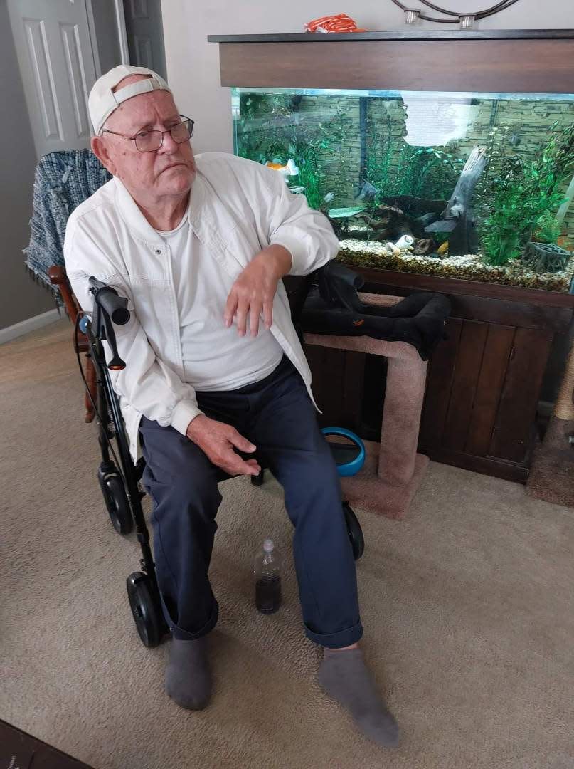 Eleck Collins watches from Fortville, Indiana, as his grandson, David Sandlin, pitches for the Oklahoma baseball team at the College World Series in Omaha, Nebraska.