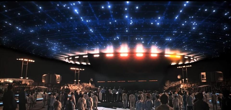 People gathered around the alien mothership in "Close Encounters of the Third Kind"
