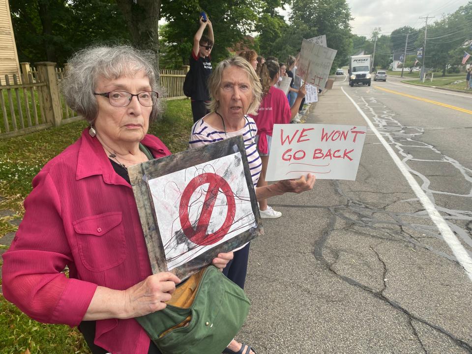 Nancy Davis and Sally Sulloway attend an abortion rights rally in front of the York Town Hall Monday, June 27, 2022, protesting the overturning of Roe v. Wade.