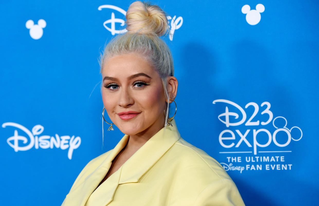 Singer Christina Aguilera poses at the Disney Legends press line during the 2019 D23 Expo, Friday, Aug. 23, 2019, in Anaheim, Calif. (Photo by Chris Pizzello/Invision/AP)