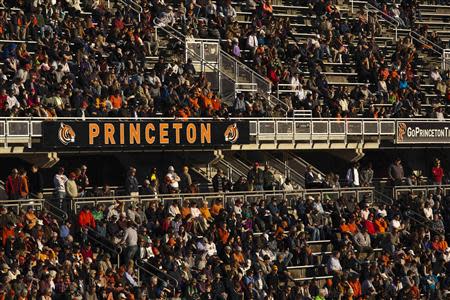 People watch a football game at the Princeton University Stadium in Princeton, New Jersey, November 16, 2013. REUTERS/Eduardo Munoz