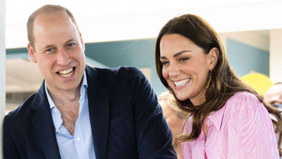 Kate and william laughing holding hands