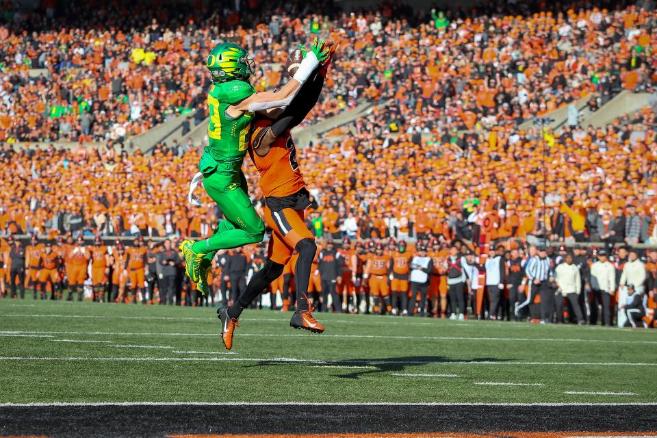 Oregon wide receiver Chase Cota hauls in a touchdown pass under coverage from Oregon State’s Rejzohn Wright as the No. 9 Oregon Ducks take on the No. 21 Oregon State Beavers at Reser Stadium in Corvallis, Ore. Saturday, Nov. 26, 2022. 