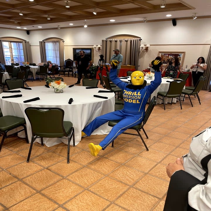 A photo of the TIMs sitting at the breakfast table