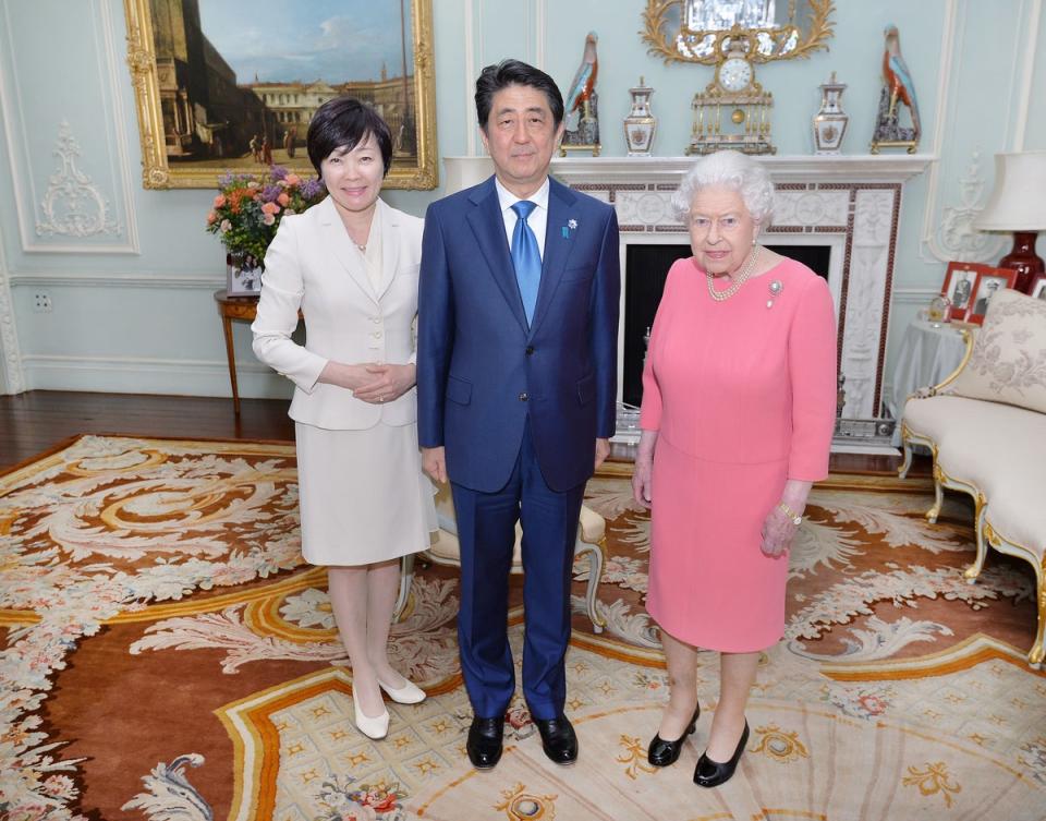 The Queen during her 2016 meeting with the then Prime Minister of Japan Shinzo Abe and his wife Akie Abe (John Stillwell/PA) (PA Wire)