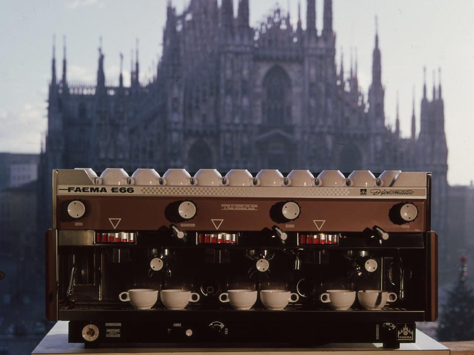 The famous Italian 'Faema' expresso machine with Milan's cathedral in the background.