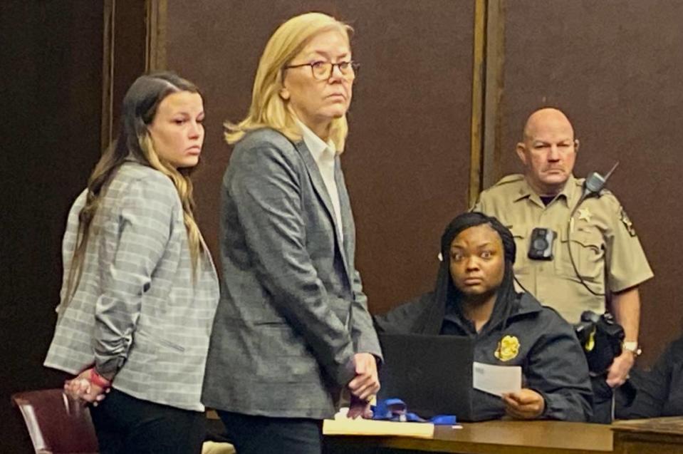 Anna Stecenko, left, stands with defense attorney Susan Henderson during her sentencing for evidence tampering in the murder of Jaylin Jaquan “Bart” Williams.