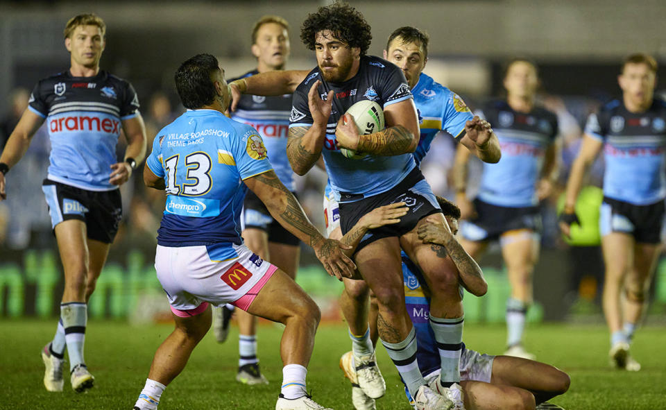 The Sharks and Titans, pictured here wearing near-identical jerseys.