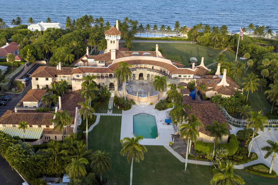 FILE - An aerial view of former President Donald Trump's Mar-a-Lago estate is seen Aug. 10, 2022, in Palm Beach, Fla. Trump's lawyers have asked a judge to postpone his Florida classified documents trial until after next year’s presidential election. The lawyers say they have not received all the records they need to prepare Trump's defense. (AP Photo/Steve Helber, File)