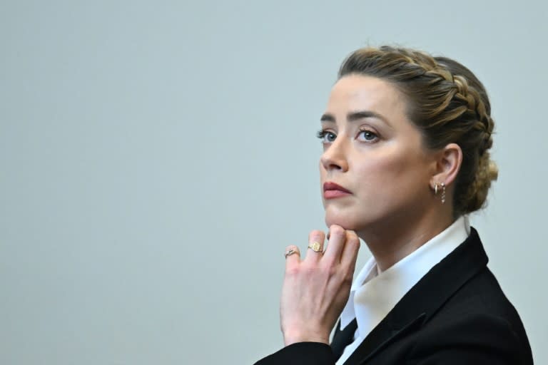 Actress Amber Heard listens to testimony in the defamation case filed against her by her ex-husband Johnny Depp (AFP/JIM WATSON)