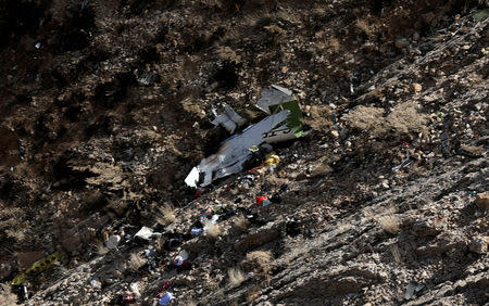 A view shows the site of a crashed plane owned by the private holding company of Turkish businessman Huseyin Basaran, Iran, March 12, 2018. REUTERS/Tasnim News Agency