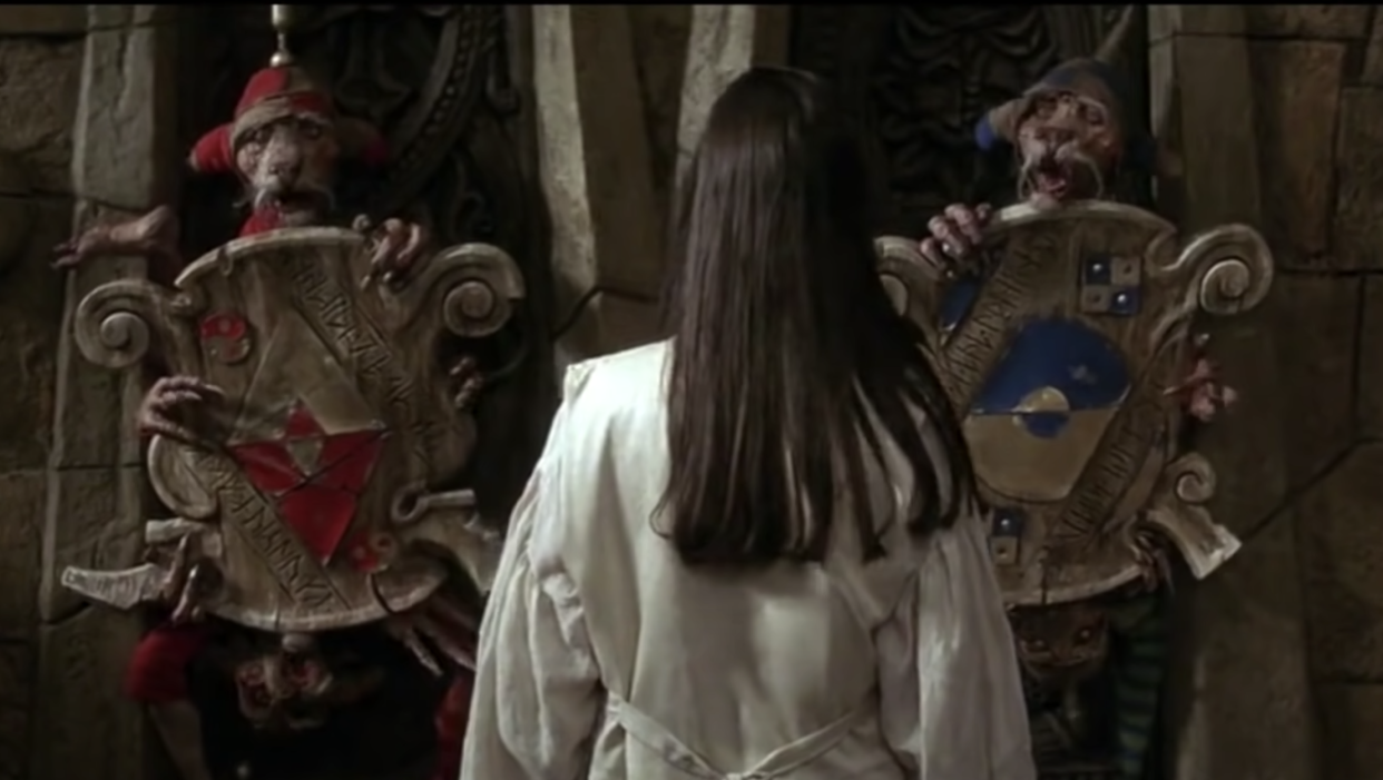 Sarah is challenged by the Four Guards in a scene from Labyrinth (Photo: TriStar/YouTube)