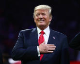 <p>President Donald Trump stands for the national anthem before the 2018 CFP national championship college football game between the Alabama Crimson Tide and the Georgia Bulldogs at Mercedes-Benz Stadium. Mandatory Credit: Mark J. Rebilas-USA TODAY Sports </p>