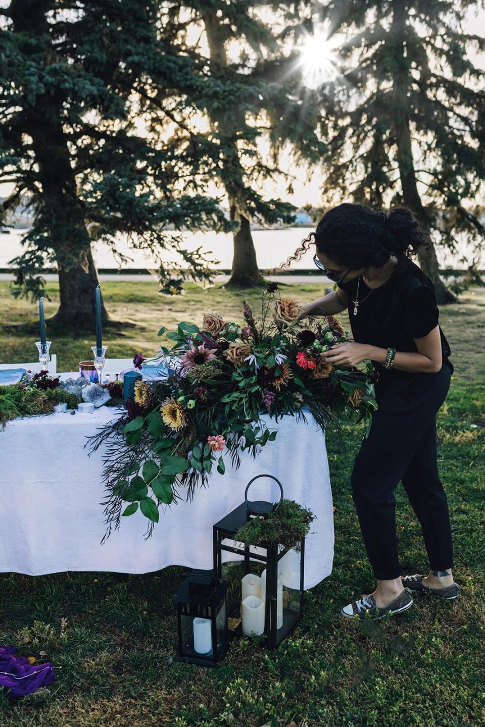 Nora Salem, owner of Bud+Bloom, makes arrangements out of cannabis plants. She moved out of her Kingsway Mall location last month to focus on saving costs.