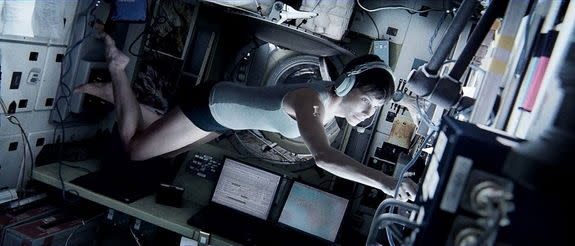 Sandra Bullock's Dr. Ryan Stone shown floating inside a space station from the Alfonso Cuarón film "Gravity."