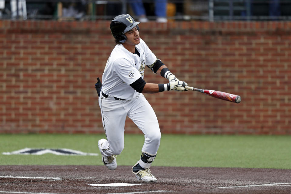 FILE - In this May 11, 2019, file photo, Vanderbilt's Austin Martin connects for a hit during an NCAA college baseball game against Missouri in Nashville, Tenn. The Detroit Tigers are rebuilding around an impressive group of minor league pitchers. Now, it might be time to add a star hitting prospect to the mix. Whether it’s Arizona State slugger Spencer Torkelson or Vanderbilt’s Austin Martin, Detroit has a chance to add another potential standout when it makes the No. 1 selection in Wednesday night’s Major League Baseball draft. (AP Photo/Wade Payne, FIle)