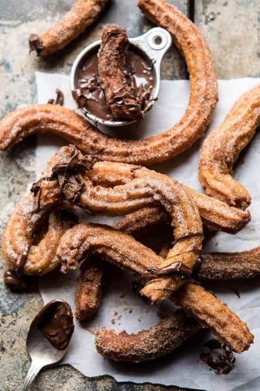 <p>Half Baked Harvest</p><p>Frying churros is totally worth the effort.</p><p><strong>Get the recipe: <a href="https://www.halfbakedharvest.com/easy-cinnamon-churros-with-coffee-chocolate-sauce/" rel="nofollow noopener" target="_blank" data-ylk="slk:Easy Cinnamon Churros with Coffee Chocolate Sauce;elm:context_link;itc:0;sec:content-canvas" class="link ">Easy Cinnamon Churros with Coffee Chocolate Sauce</a></strong></p>