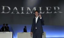 Incoming Daimler CEO Ola Kaellenius lifts a thumb prior to the annual shareholder meeting of the car manufacturer Daimler in Berlin, Germany, Wednesday, May 22, 2019. (AP Photo/Michael Sohn)