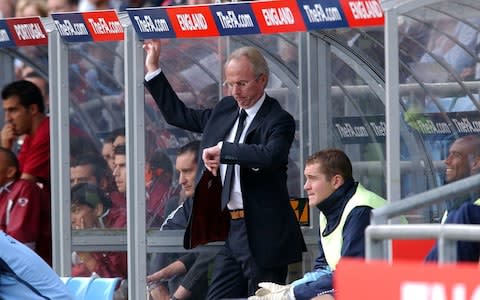 Sven-Goran Eriksson looks at his watch during the first half of an International friendly match against Portugal at Villa Park in 2002 - Credit: PA