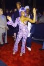 <p>Lil' Kim on the red carpet at the MTV Video Music Awards in New York City on September 9, 1999.</p>