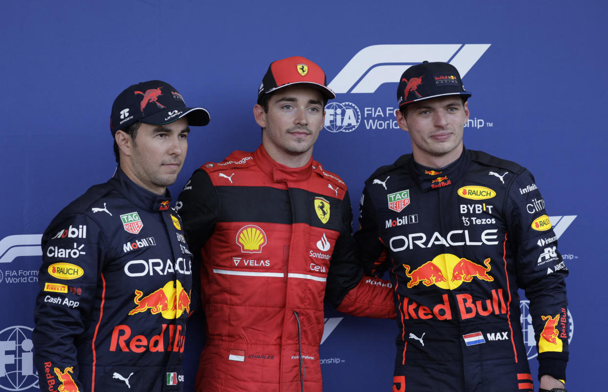 Formula One F1 - Azerbaijan Grand Prix - Baku City Circuit, Baku, Azerbaijan - June 11, 2022 Ferrari's Charles Leclerc celebrates after winning pole position alongside second place Red Bull's Sergio Perez and third place Red Bull's Max Verstappen REUTERS/Leonhard Foeger